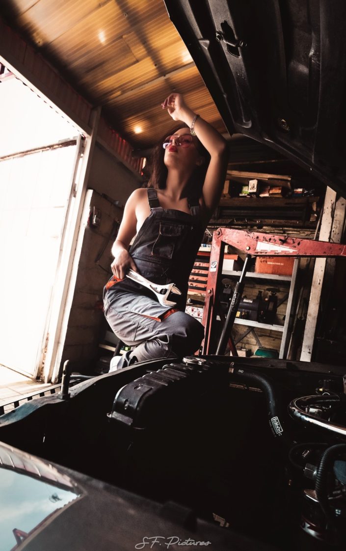 Gorgeous mechanic girl Katerina repair a car in sexy pose for fred photographe boudoir Paris