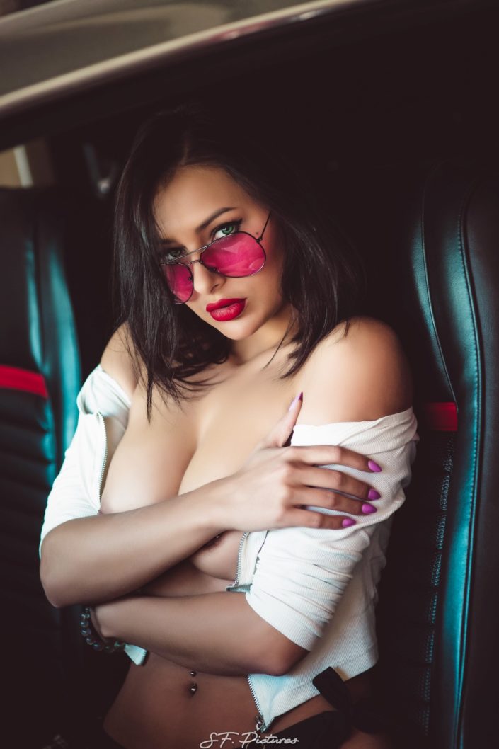 Perfect beauty Katerina posing topless in the car by fred photographe boudoir Paris